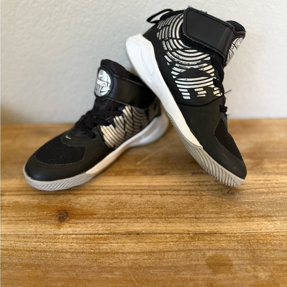 Kids Nike Black and White TeamHustle Sneakers